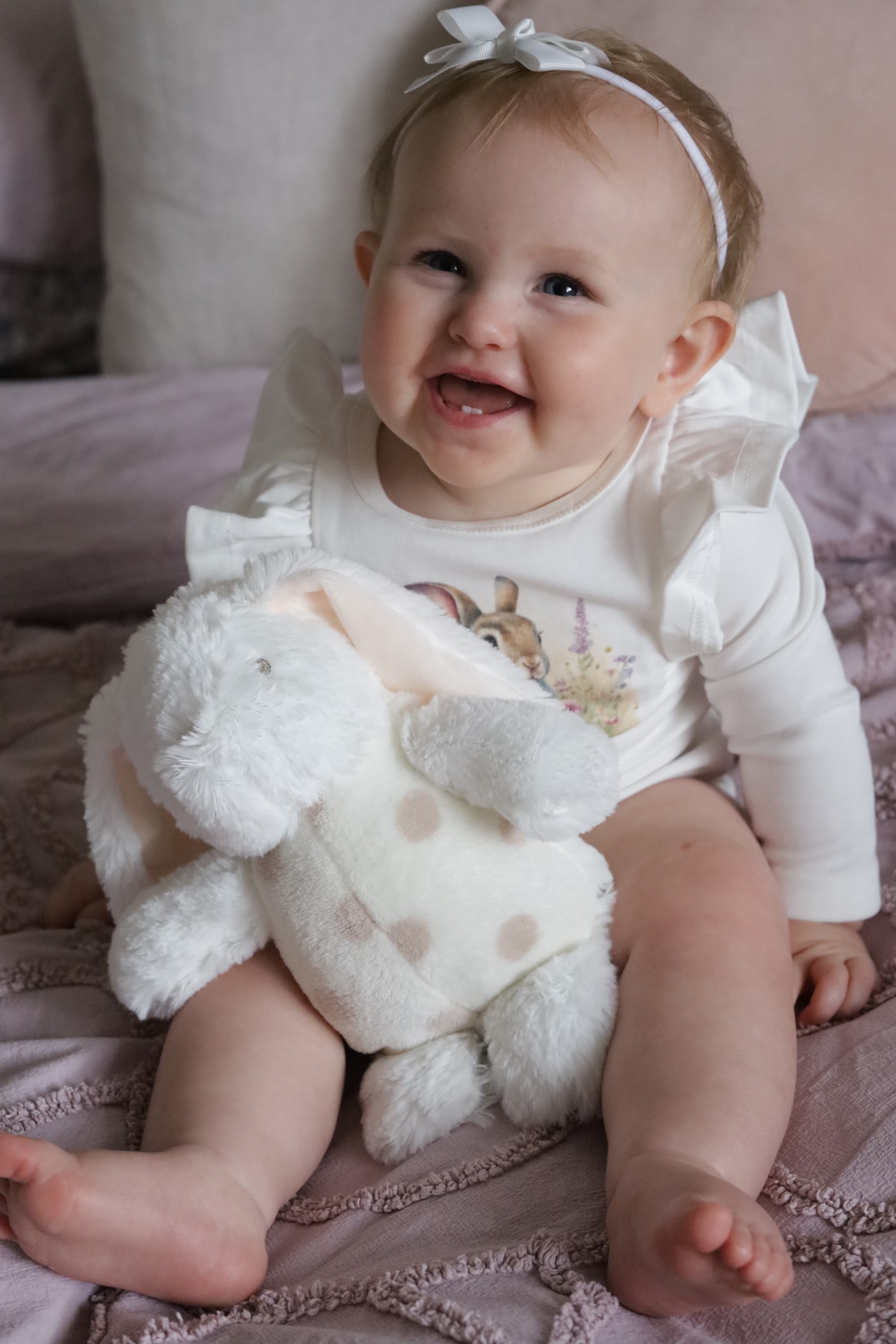 Soft cream bunny cuddly companion plush toy by Cutesy Wootsy, perfect for baby girls and toddler snuggles.