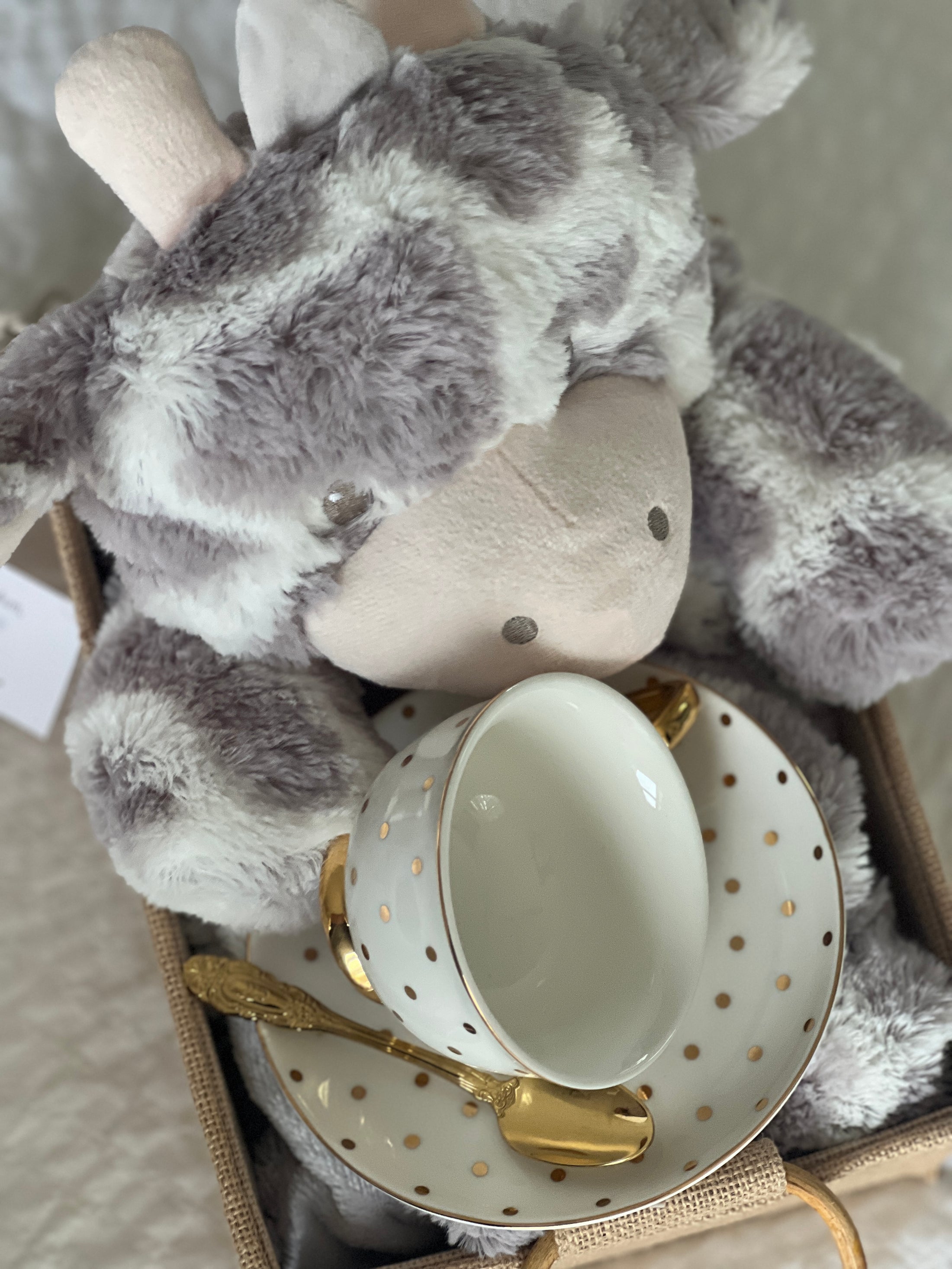Neutral luxury Mum and Bub Hamper featuring Skye Giraffe comforter and gold teaware.