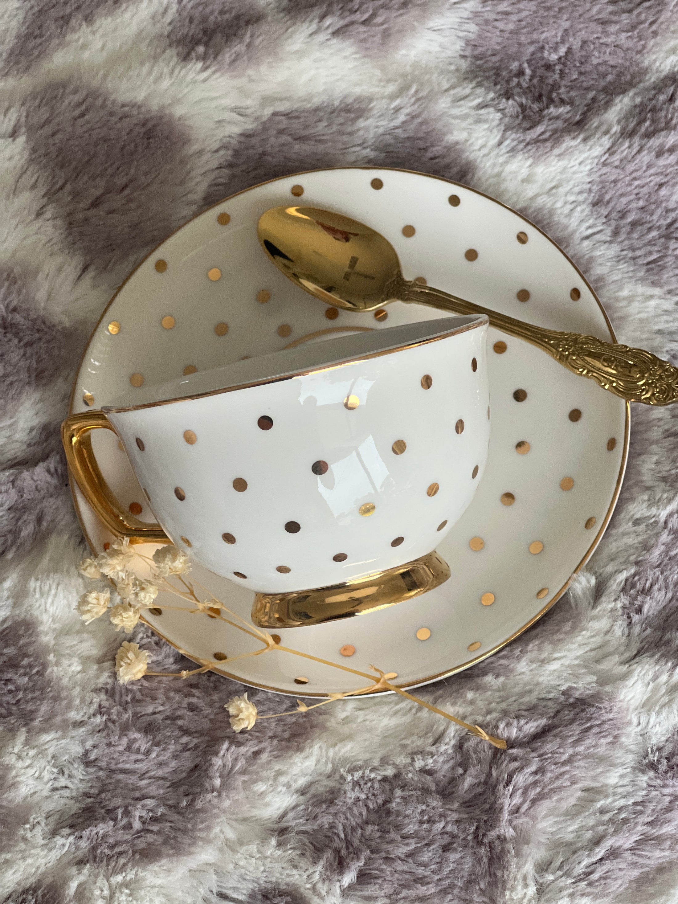 Cristina Re gold polka dot teacup and saucer from the Skye Giraffe Mum and Bub Hamper.